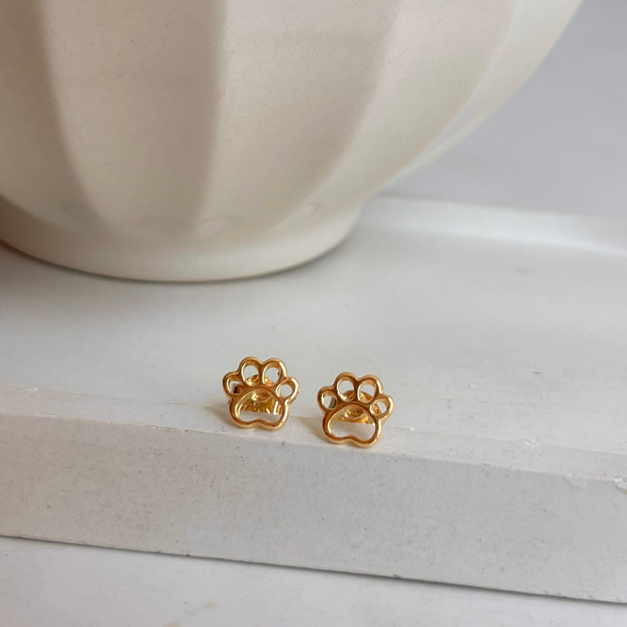 Aretes Huellas