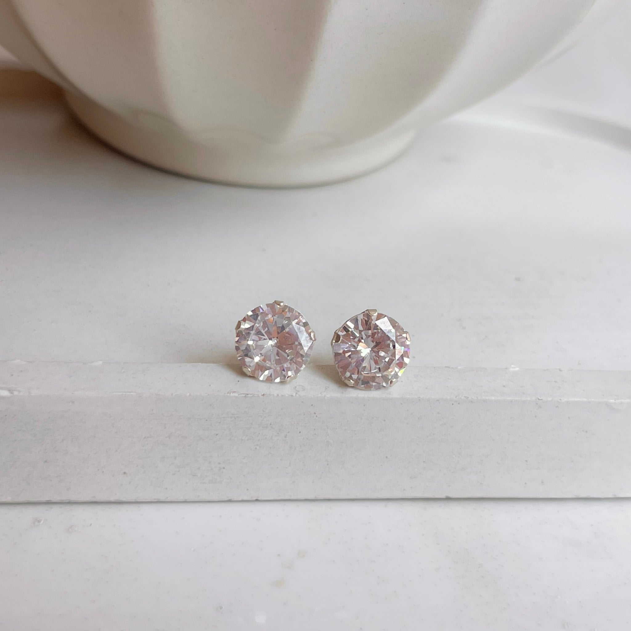 Aretes Meli