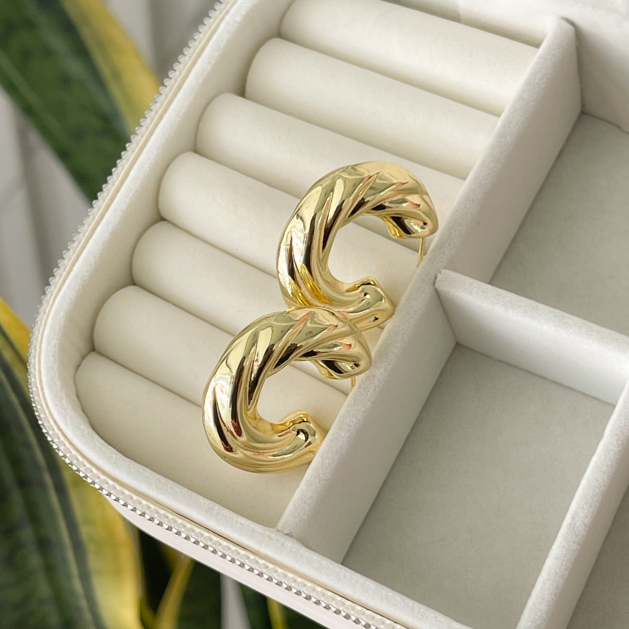 Aretes María